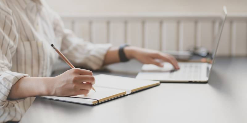 photo-of-person-writing-on-notebook-3758898.jpg